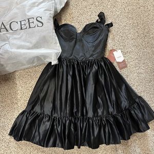 Stacee’s A-Line Sweetheart Sleeveless Short ruffled satin dress w/bow straps.